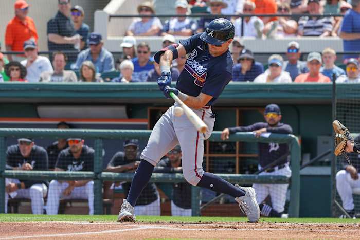 Mar 22, 2023; Lakeland, Florida, USA; Atlanta Braves left fielder Sam Hilliard (14) hits a single during the first inning against the Detroit Tigers at Publix Field at Joker Marchant Stadium. Mandatory Credit: Mike Watters-USA TODAY Sports
